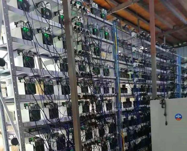 A high-performance Bitcoin miner in action, showcasing its robust hardware for optimal hash rates
