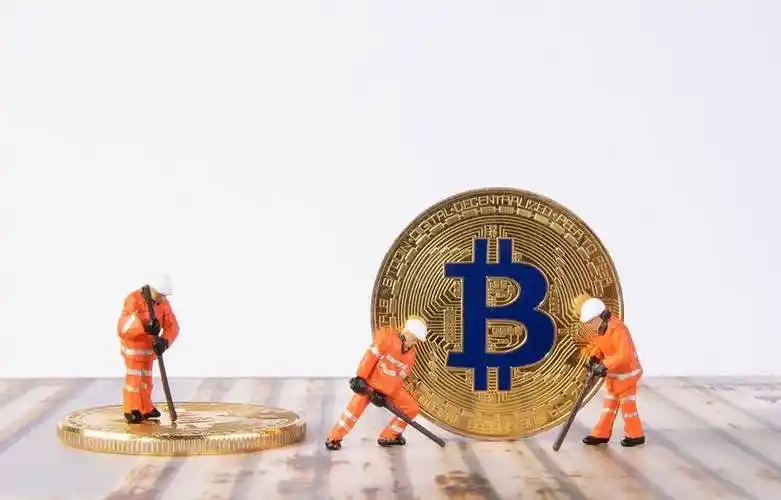 A miner checking the operation of a mining machine in a mining farm
