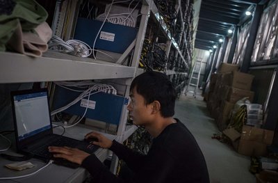State-of-the-art cryptocurrency mining farm with rows of GPU rigs